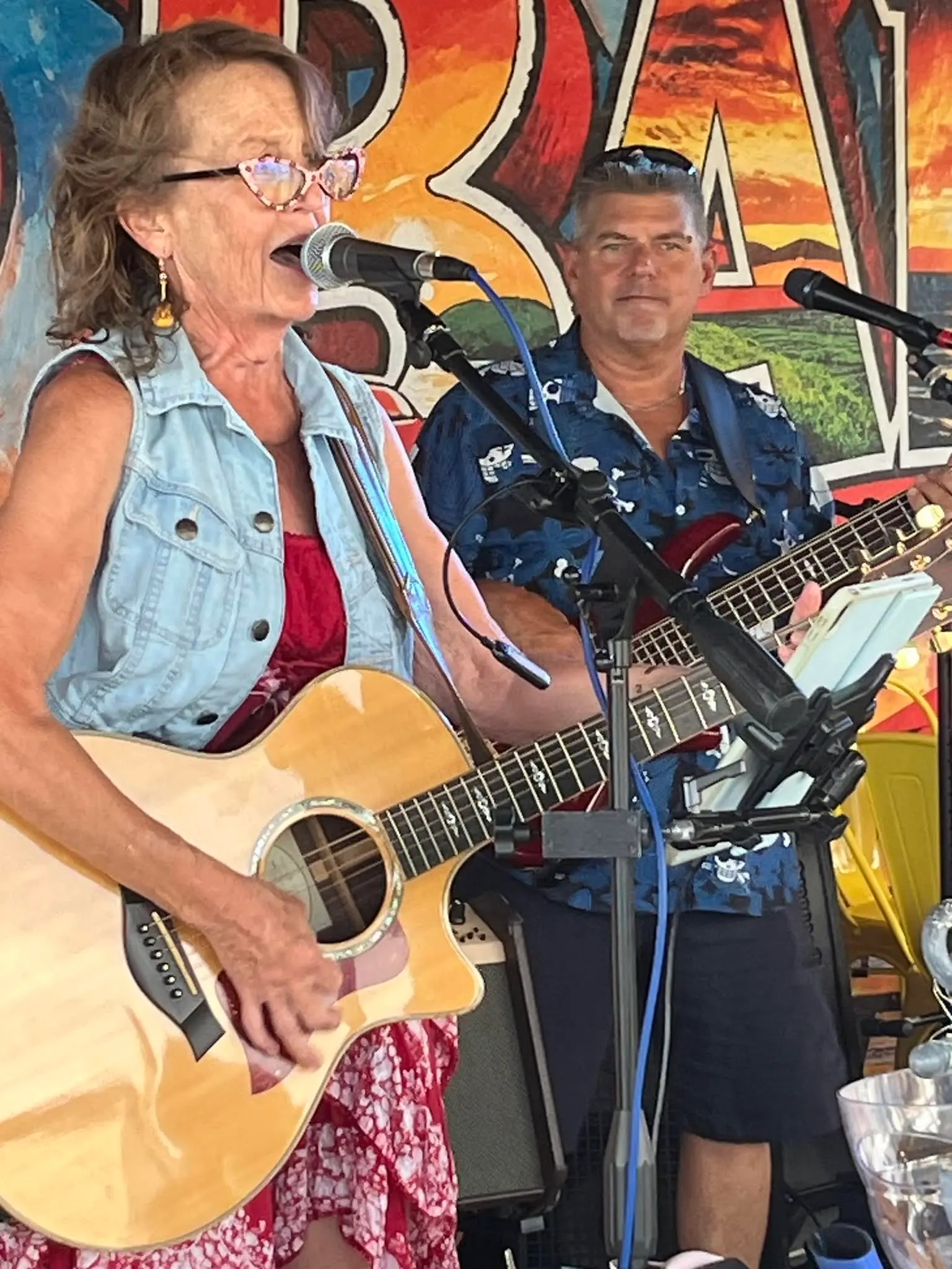 Rita B singing with Jim Gordon on guitar behind her